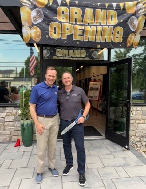 Mayor Martin and Vitale Inspections Grand Opening with Group of People