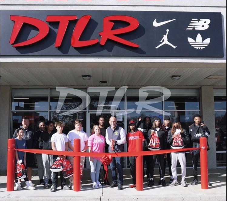Group Photo at DTLR Grand opening ribbon cutting with Staff and councilman anthony carabello