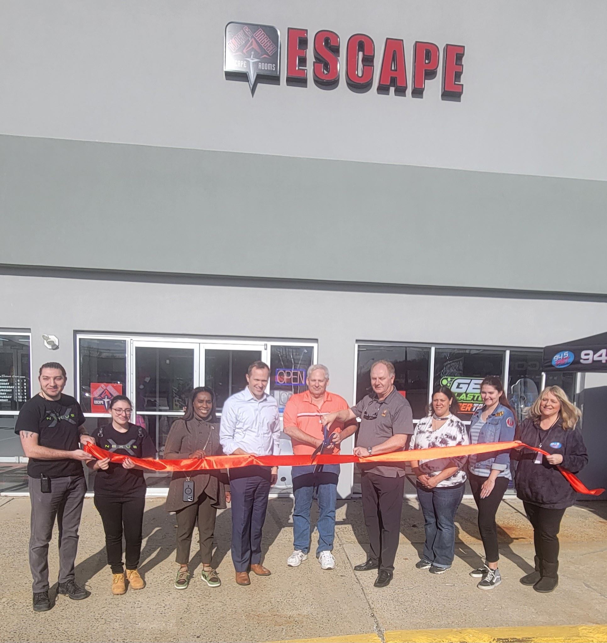 Cloak and Dagger group photo with owners, Mayor Martin and Tennille McCoy